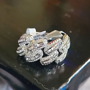 Iced out baguette cut.